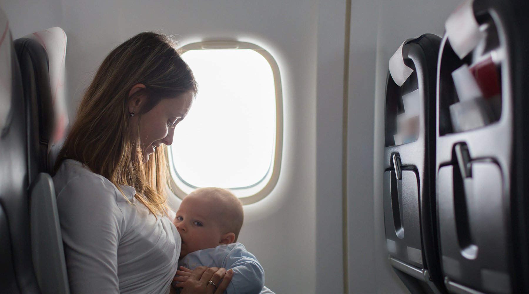 Tips for Breastfeeding on a Plane - Lovemere